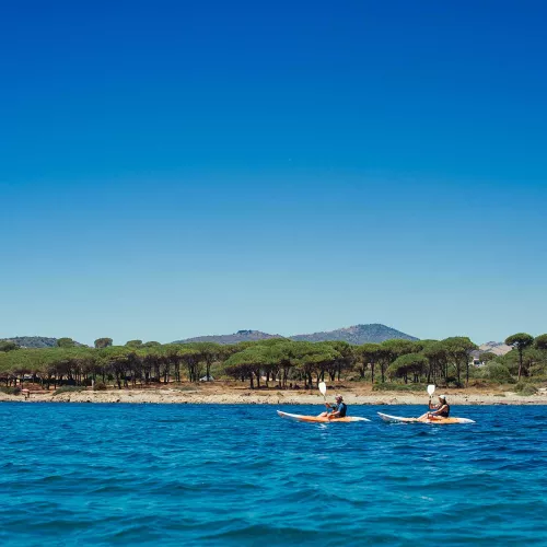 Two people kayaking in Sardinia