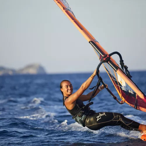 Female windsurfer in Greece