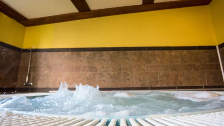 A large hot tub in the wellness area