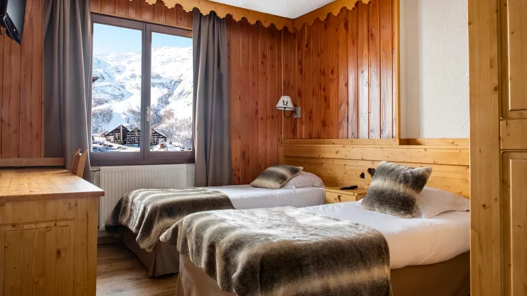 One of the twin rooms