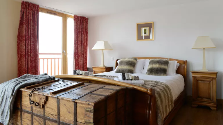 The bedroom in the exceptional suite