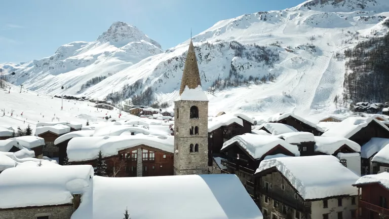 Church and snowy rooftops of Val d’Isère