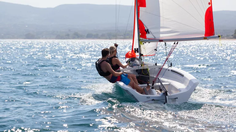 Dinghy sailing at Buca Beach Club