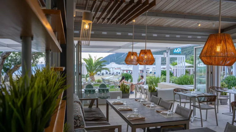 Restaurant and outdoor seating at Cosmos Beach Club