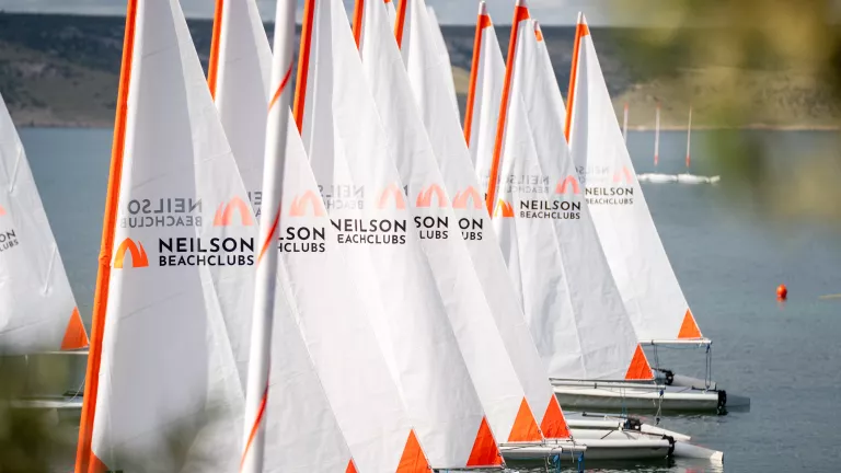 Dinghies lined up at Alana Beach Club