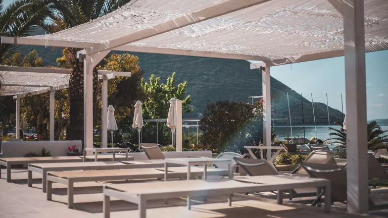Beachfront terrace at Cosmos Beach Club