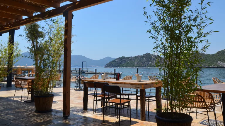 Waterfront restaurant terrace at Neilson x Cook's Club Adakoy