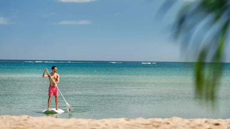 Paddle boarding at Neilson x The Ravenala Attitude