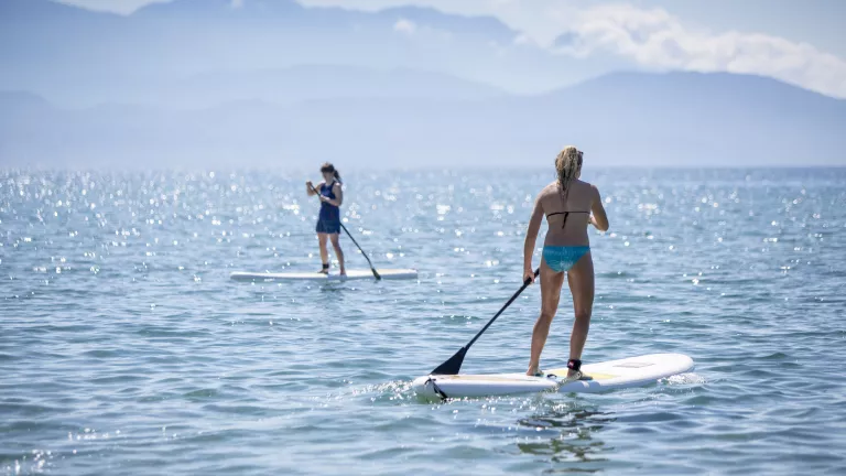 Paddle boarding at Cosmos Beach Club