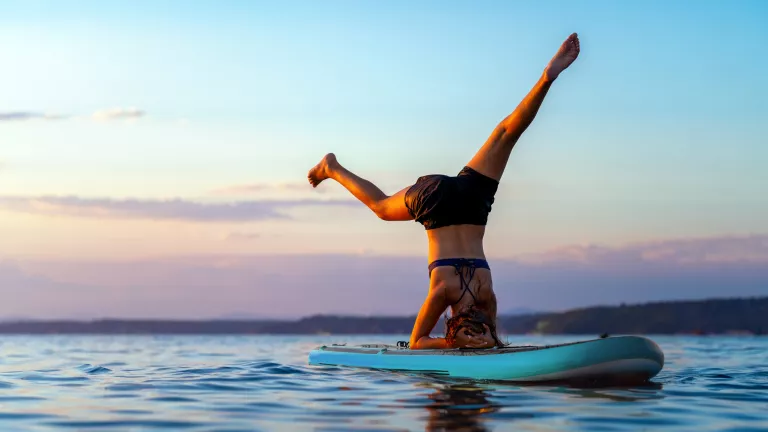 SUP yoga at Neilson x The Ravenala Attitude