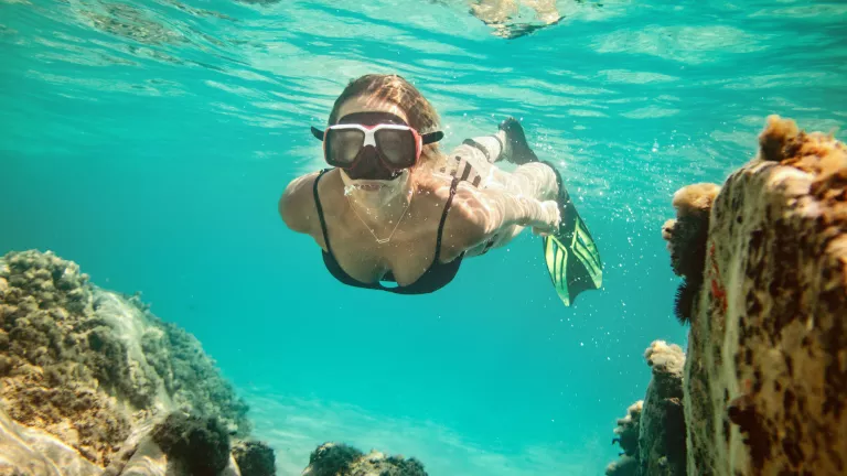 Snorkelling in the crystal clear waters at Neilson x Cook's Club Adakoy
