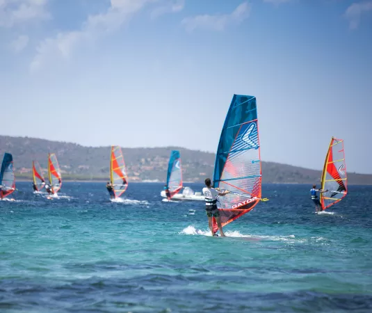 A group of intermediate windsurfers