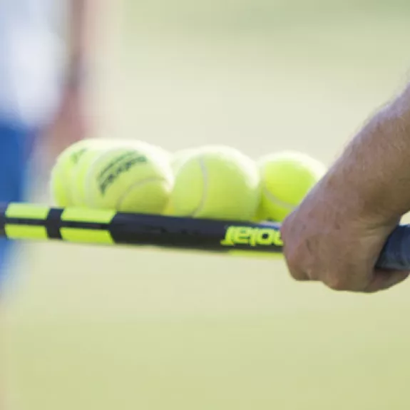 people on tennis court