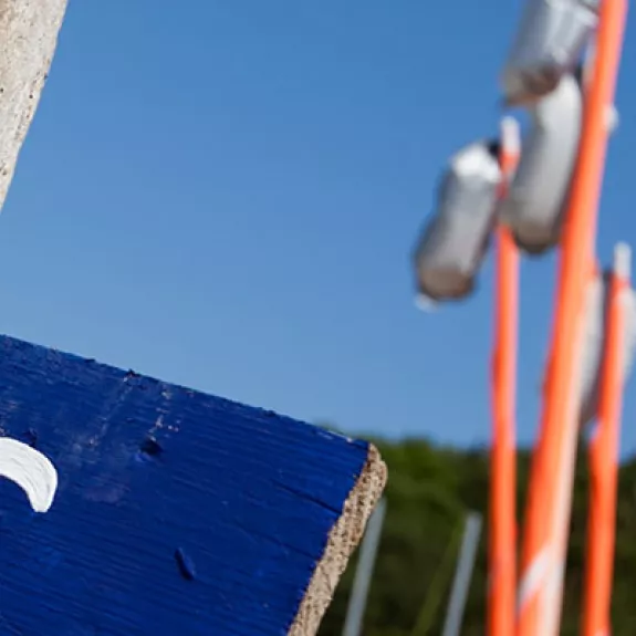 Beach and sailing signpost
