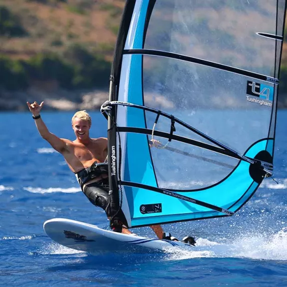 Man windsurfing in Greece