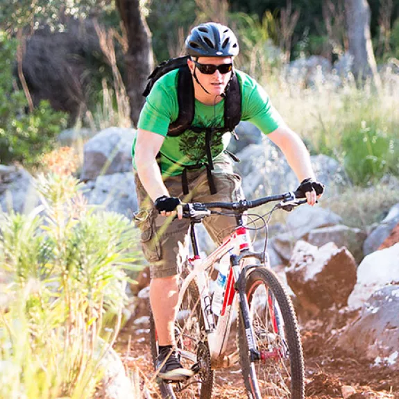 two men off road mountain biking