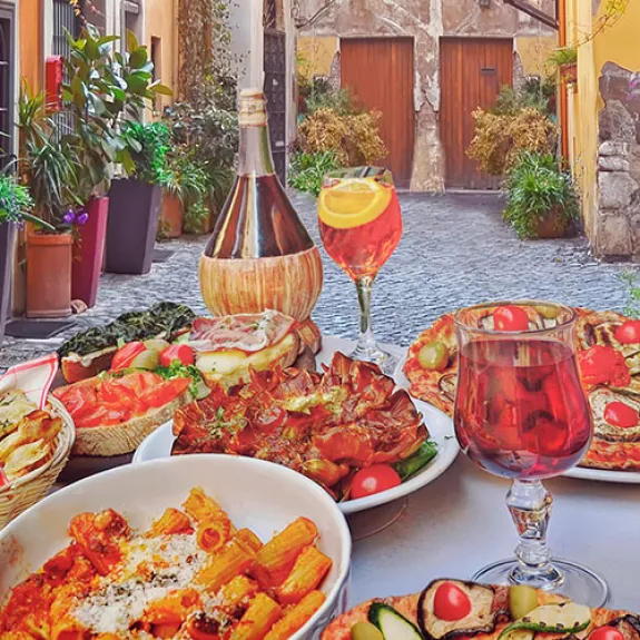 Italian food and drink on a restaurant table