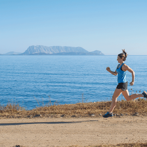 girl running by the sea