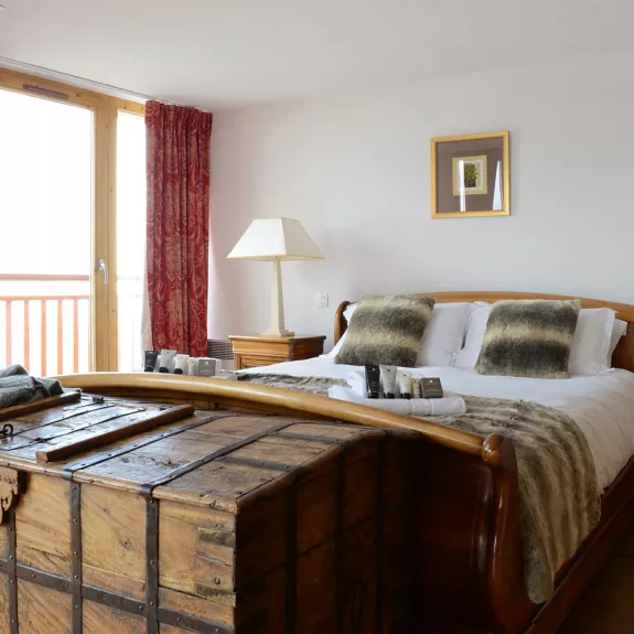 The bedroom in the exceptional suite