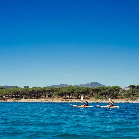 Two people kayaking in Sardinia