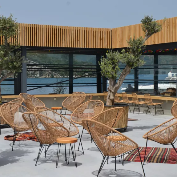 Poolside seating at Neilson x Cook's Club Adakoy