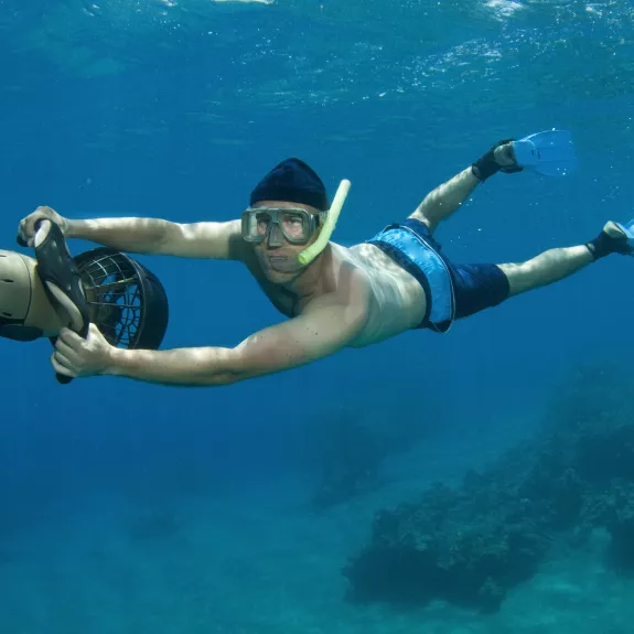 Explore vibrant marine life with sea scooters at Neilson | Cook's Club Adakoy