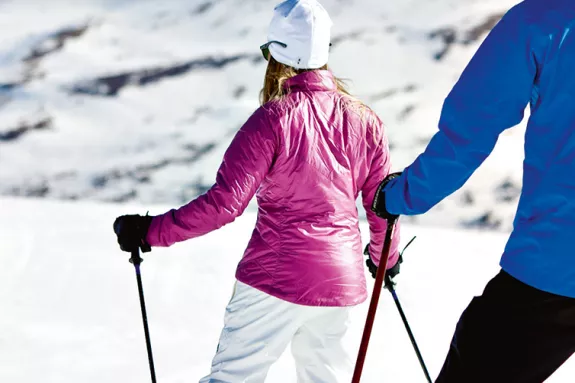 A couple learning to ski