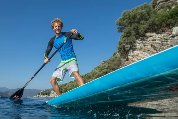 Man stand up paddle boarding 