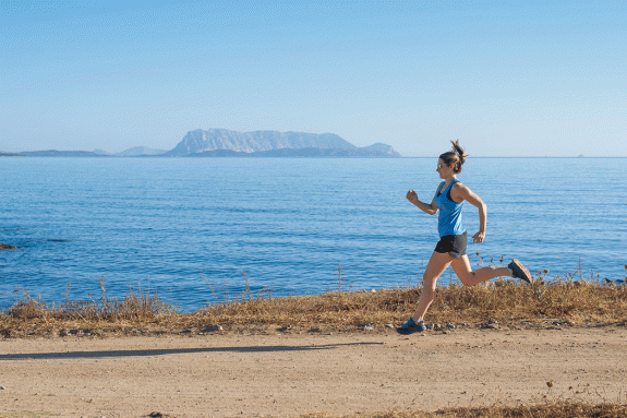 girl running by the sea