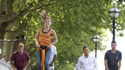 girl on Pogo stick in Londin