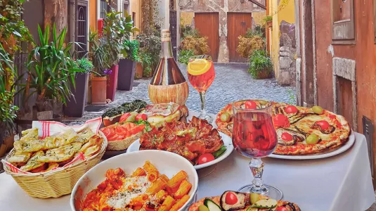 Italian food and drink on a restaurant table