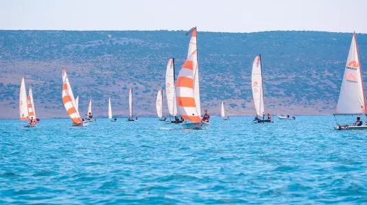 group of people dinghy sailing in Croatia