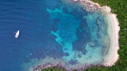 Aerial view of yacht in bay at Sivota, Greece
