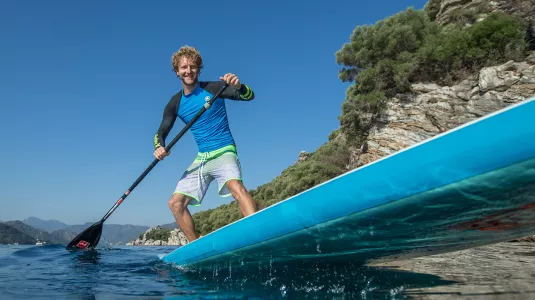 Man stand up paddle boarding 