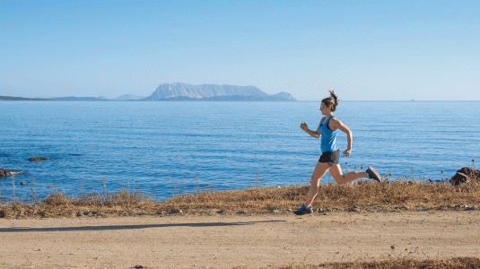 girl running by the sea