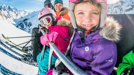 Family on ski lift