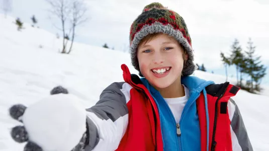 boy with snowball