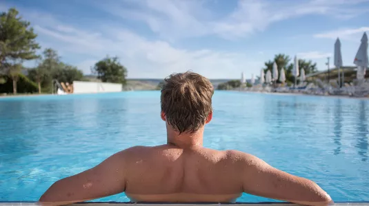 swimming pool at alana beachclub