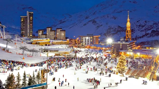 A snow covered fare and ski resort
