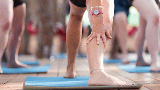 group of people doing yoga