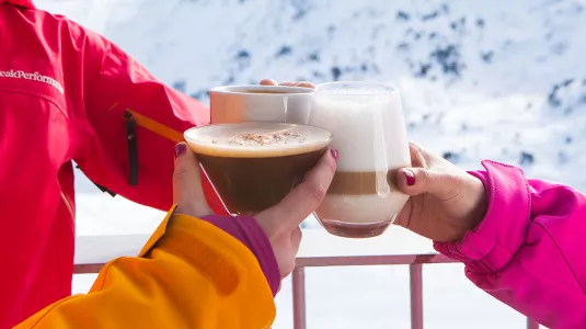 People drinking warm drinks