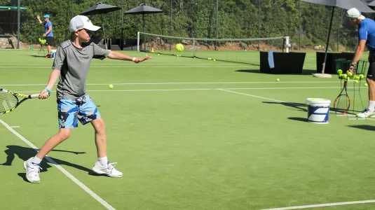 Kids playing tennis