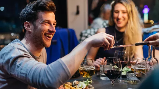 people eating and drinking