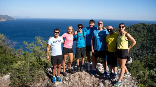 Group smiling with a view