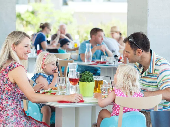 Family eating in restaurant