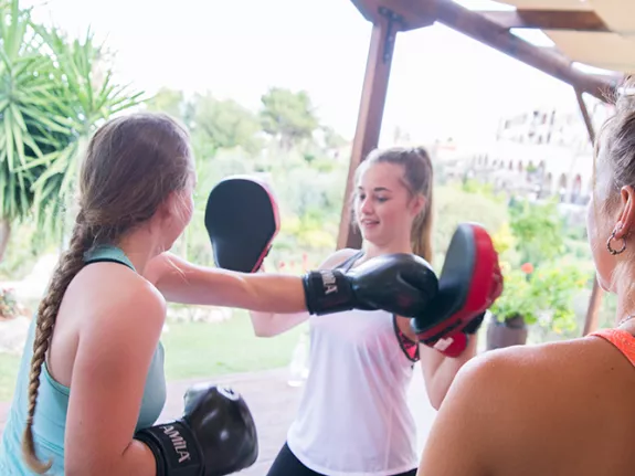teenage girls doing boxercise